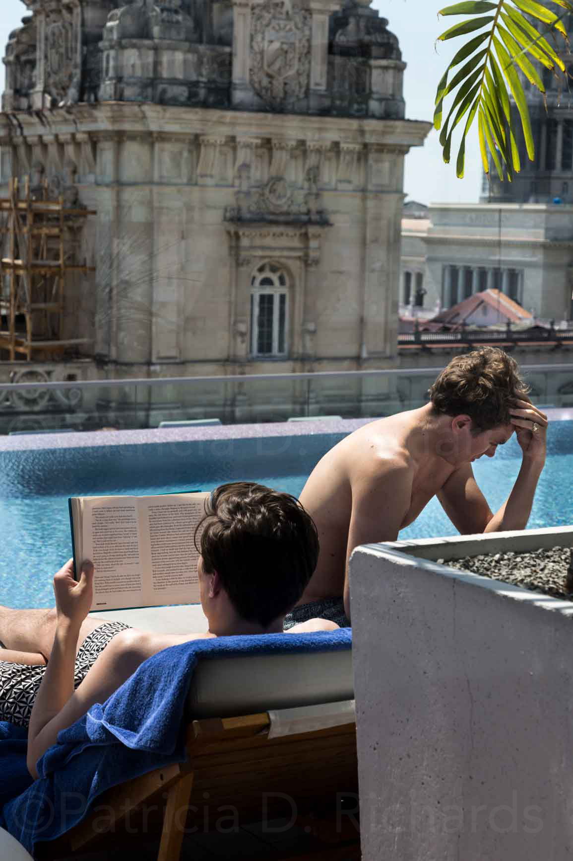 reading by the pool